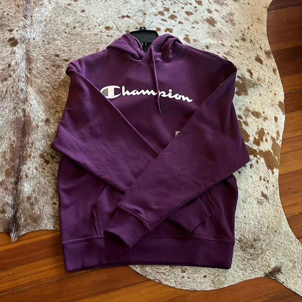 Selling a plum Champion hoodie size Medium